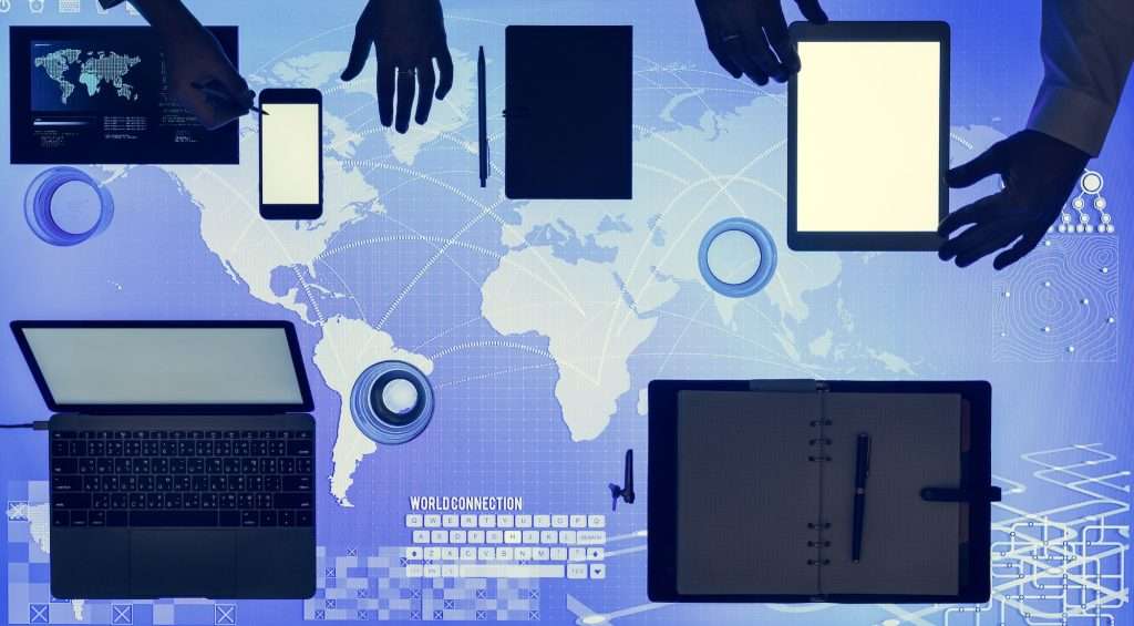 Digital devices on cyber space table